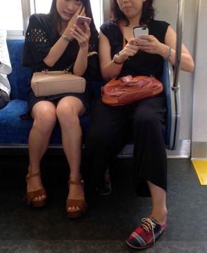 My shot inwards of the train, up mini-skirt voyeur. Japanese girl